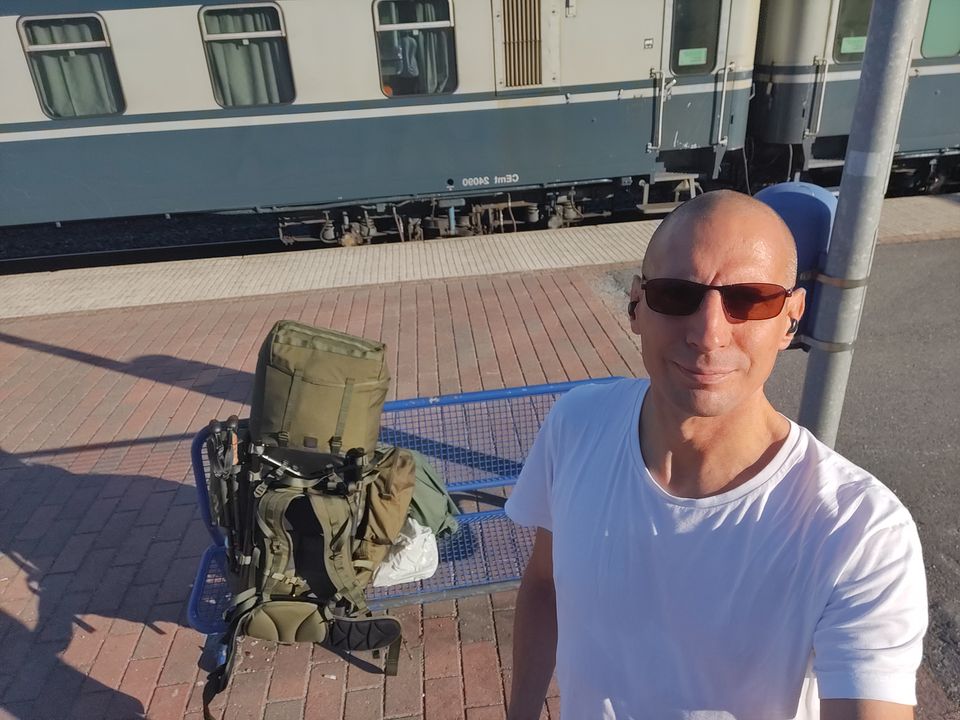 At the Hämeenlinna train station, with a huge backpack, eagerly waiting for the train to start the journey